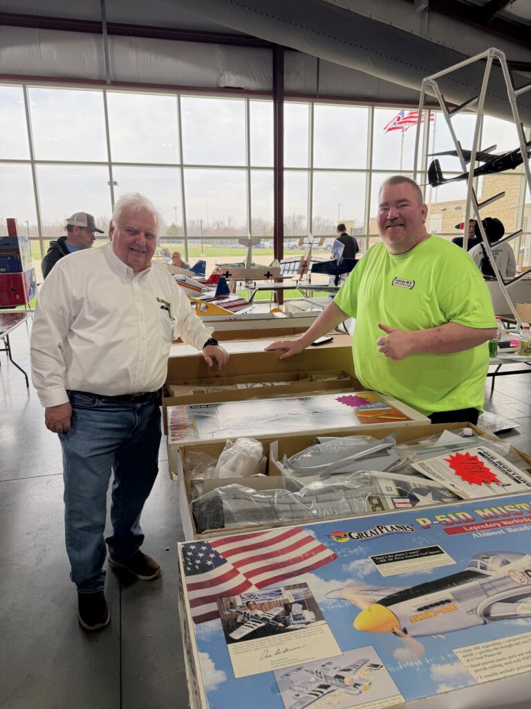 Wingmasters Modelrama event organizer Paul Stimmel (L) and Mr. Swapper himself Henry Rauhaus (R) selling his wares. Henry is the event organizer of the annual Toledo show.