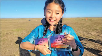Kiana Lin holds her trophies from the Southern California Aero Team (SCAT) contest that took place in Lost Hills, Calif., on March 14-15, 2026. 