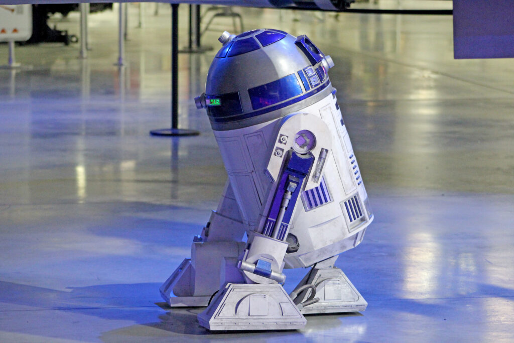 R2D2, the iconic space droid, makes a guest appearance in the exhibit. 